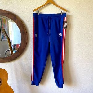 NBA official. Mens large. Royal blue. Red white striped. Joggers